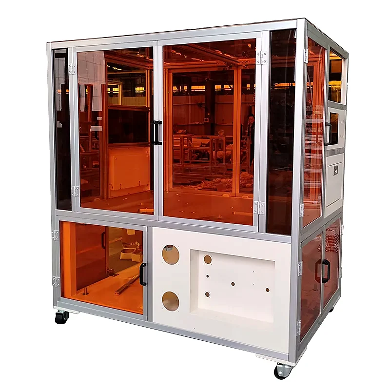 Clear-panel aluminium machine enclosure around production equipment
